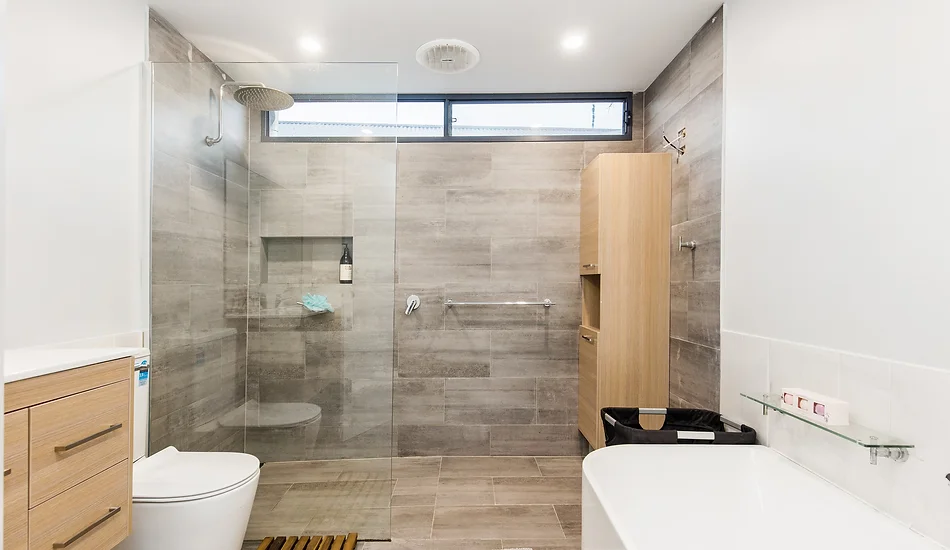 Walk-in shower in a modified bathroom